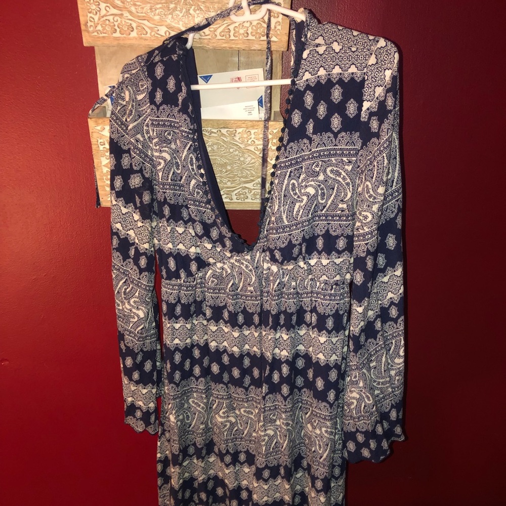 Long sleeved deep neck Flowy dress